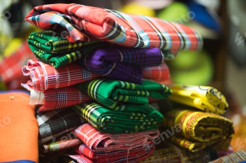 Preview: Assortment of fabric stacked on top of each other