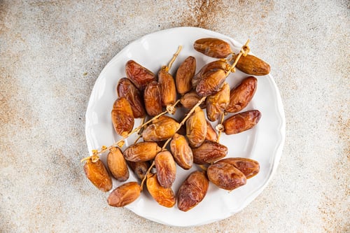 Preview: date branch dried fruit fresh appetizer food snack on the table copy space food background rustic