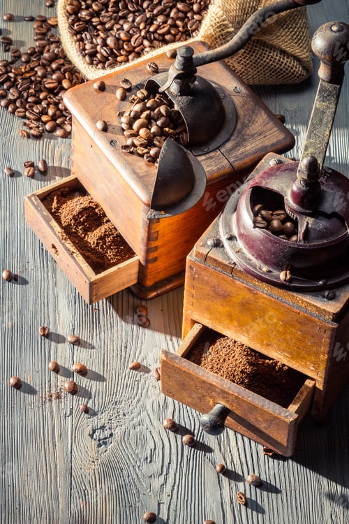 Preview: Old coffee grinders with burlap sack