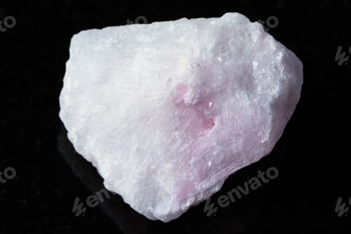 Preview: sample of raw pink aragonite mineral on black