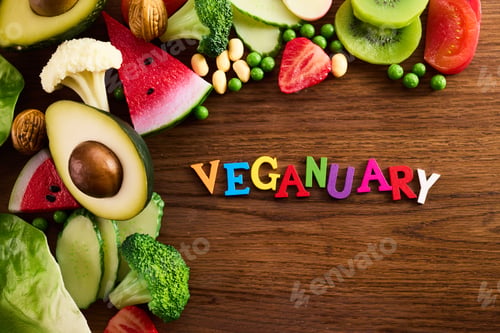 Preview: Vegetarian and vegan diet month in january called Veganuary. healthy raw vegetables and fruits on