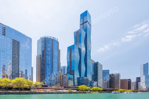 Preview: Vibrant sunny view of Chicago downtown skyline under a blue sky
