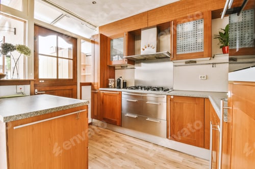 Preview: Corner wooden kitchen furniture in a modern house
