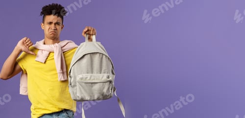Preview: Education, university and trends concept. Portrait of gloomy disappointed young male student