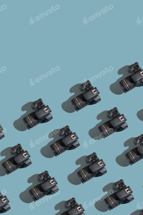 Preview: Vertical photo with pattern from many cameras on grey-blue background with copy space