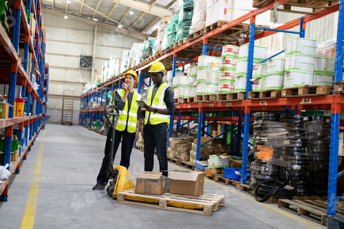Preview: Warehouse workers checking the inventory.