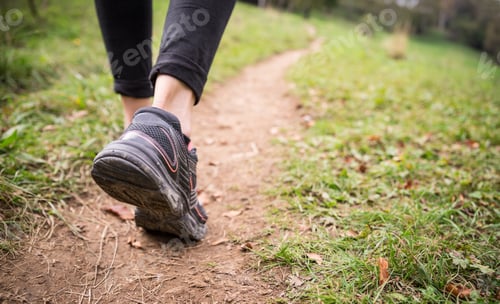 Preview: Woman walking on the path