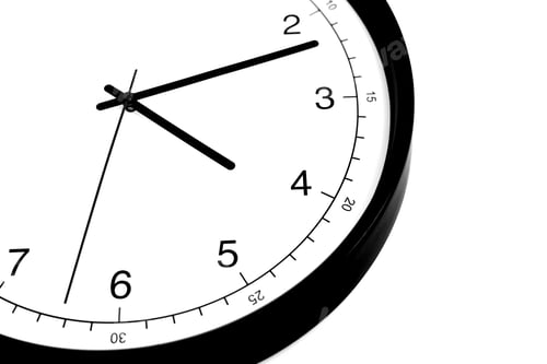 Preview: Part of analogue plain wall clock on white wall background. Four o'clock twelve minutes. Close