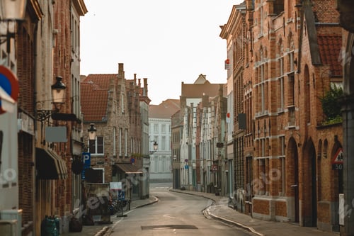 Preview: BRUGGE, BELGIUM - NOVEMBER 02, 2016: traditional belgian architecture on old narrow street in bruges