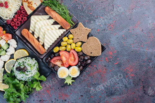 Preview: Traditional rich breakfast table with variety of foods