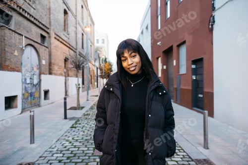 Preview: Portrait of a young woman on street