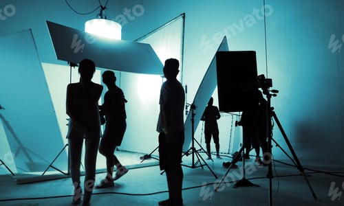 Preview: Shooting studio for photographer and creative art director with production crew team setting up ligh