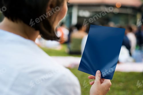 Preview: People relaxing listening music in the park