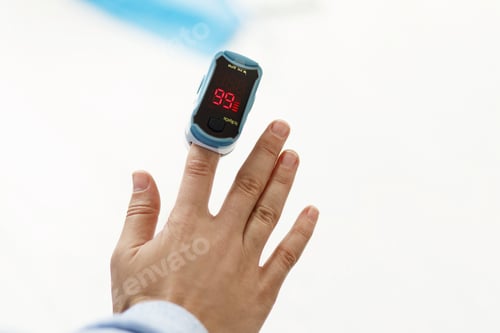 Preview: Pulse Oximeter on finger, measuring blood oxygen level, detecting coronavirus pneumonia