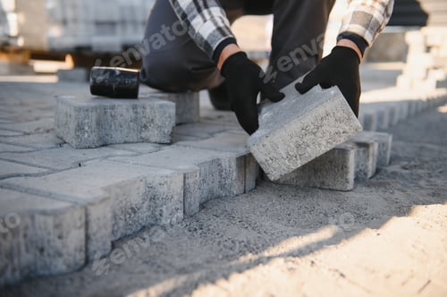 Preview: Landscaping paver worker laying paving stones