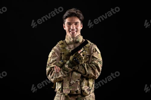 Preview: front view of military serviceman in uniform holding gun on black background navy soldier