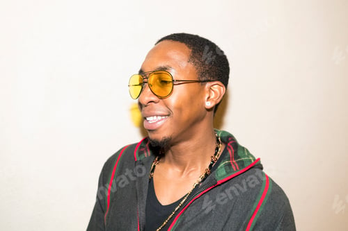 Preview: Portrait of man looking away smiling