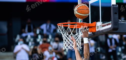 Preview: basketball going through hoop during game