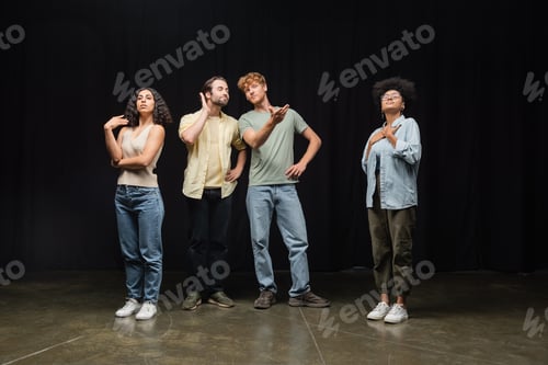 Preview: Four Young Adults Performing in a Theater