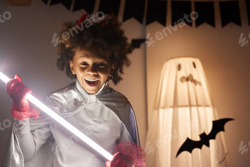 Preview: Ecstatic boy with glowing light stick