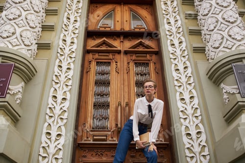 Preview: student on the street near the building rest Lifestyle