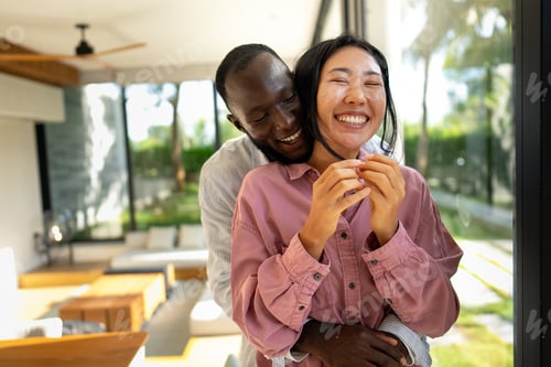 Preview: Happy diverse couple enjoying meaningful moments together, embracing love, connection, and joy