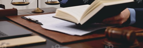Preview: Lawyer working with documents at wooden table in office, closeup. Banner design