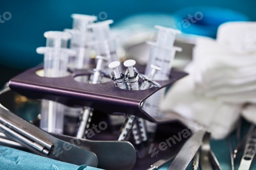 Preview: Hands Holding Syringe and Transfer Fat with Nano Fat Transfer Tool in Operation Room