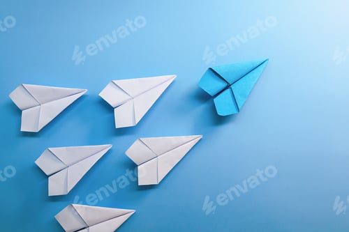 Preview: blue paper plane is leadership with white paper plane