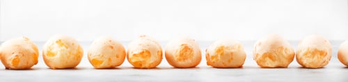 Preview: Delicious custard cheese buns on gray kitchen table background, selective focus