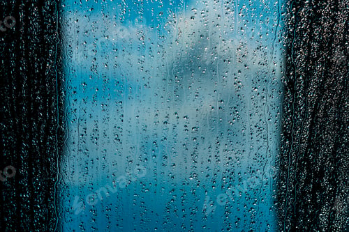 Preview: rain drops on window blue background