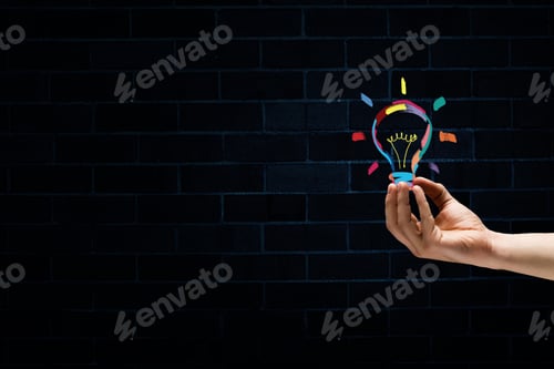 Preview: Male Hand On Dark Background Showing Drawn Light Bulb