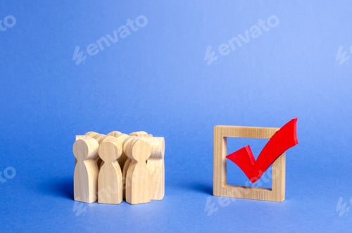 Preview: Crowd of people looking at a red wooden checkmark for voting on elections on a blue background