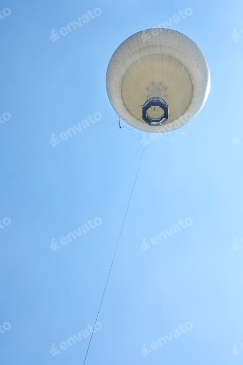 Preview: View from the ground to a balloon in the blue sky, Ayarkon