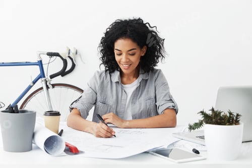 Preview: Attractive self-employed dark-skinned designer enjoying new interesting engineering project, working