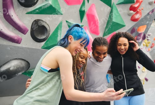 Preview: Group Of Multi-Cultural Friends Looking At For Selfie By Climbing Wall At Indoor Activity Centre