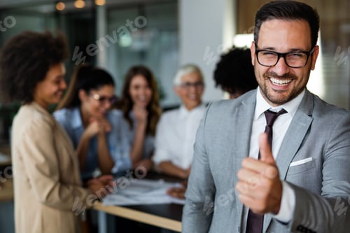 Preview: Happy group of business team celebrating a good job in the office. Business and finance concept