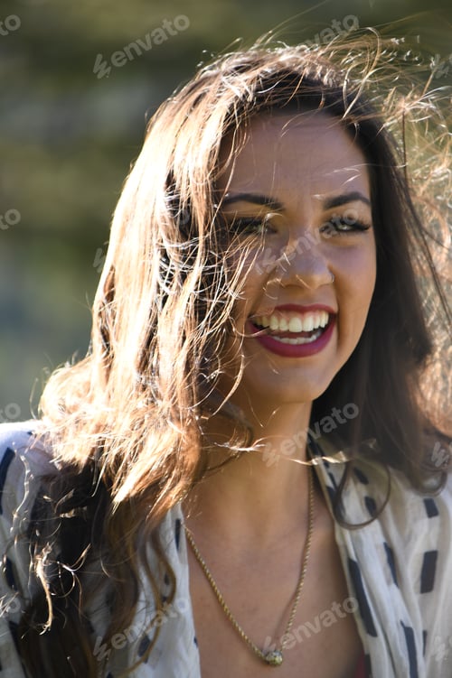 Preview: Beautiful candid portrait of a young smiling confident healthy millennial woman