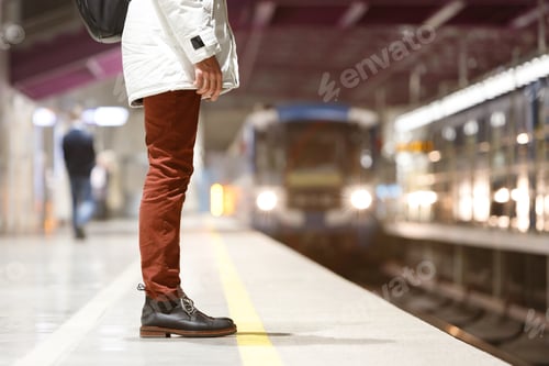 Preview: man waiting train at metro station