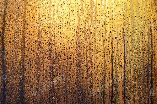 Preview: The texture of misted glass with a lot of drops and drips of condensation against the sunlight