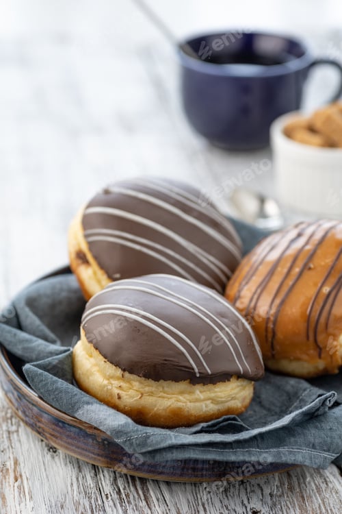 Preview: Donut or bun made from sweet yeast dough stuffed with chocolate and icing.