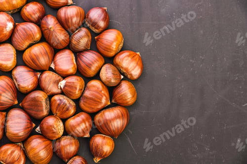 Preview: Ripe chestnuts close up. Raw Chestnuts for Christmas. Fresh sweet chestnut