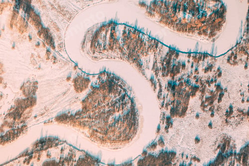 Preview: Aerial view forest woods and river landscape in winter day. Top view of beautiful european nature