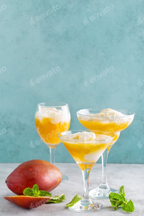 Preview: Refreshing summer mango cocktail with fresh juice and ice cream