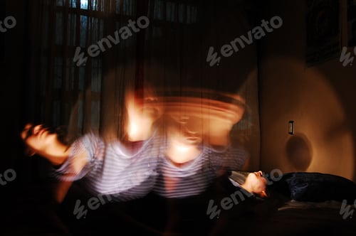 Preview: Woman in motion blur at night