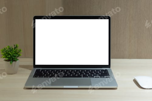 Preview: Modern Minimalistic Workspace with Mockup Laptop on Desk for Creative Professionals and Freelancers