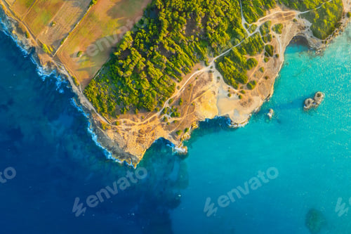 Preview: Drone view of the sea coast. Rocky shore and sea water. Vacation and travel.