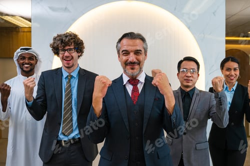 Preview: Successful business team working together in a co-working office