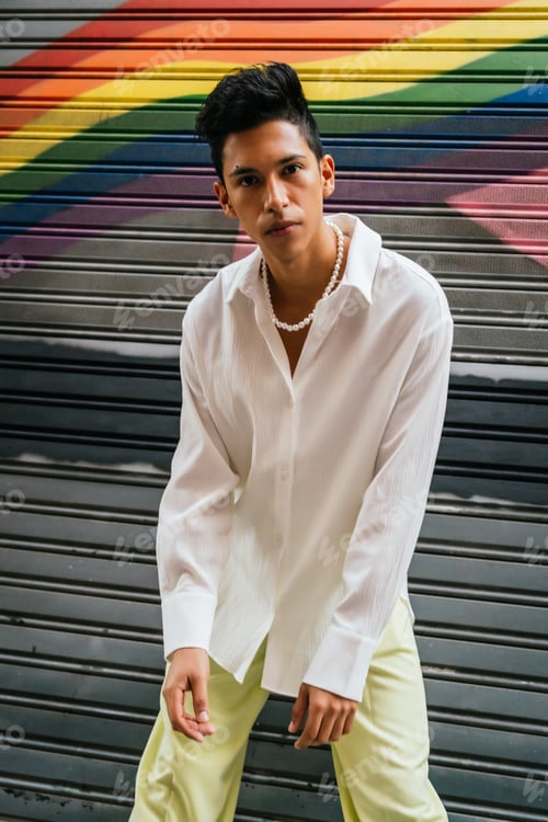 Preview: Hispanic man on a LGTB flag background
