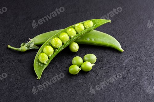 Preview: Sugar snap peas with mint on a rustic wood background